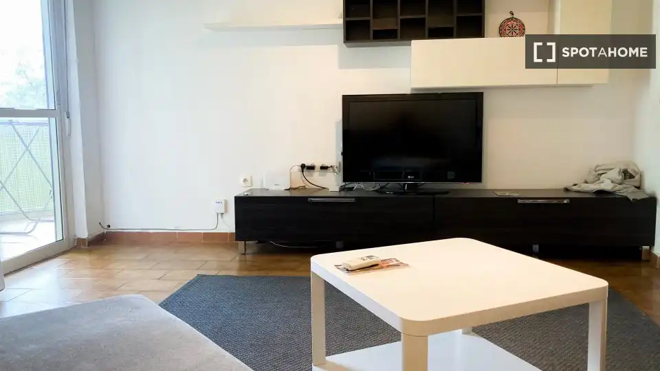 Sala d'estar de Apartament per a compartir en Sevilla amb Aire condicionat, Terrassa i Moblat