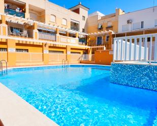 Swimming pool of Flat for sale in Los Alcázares  with Air Conditioner, Terrace and Storage room