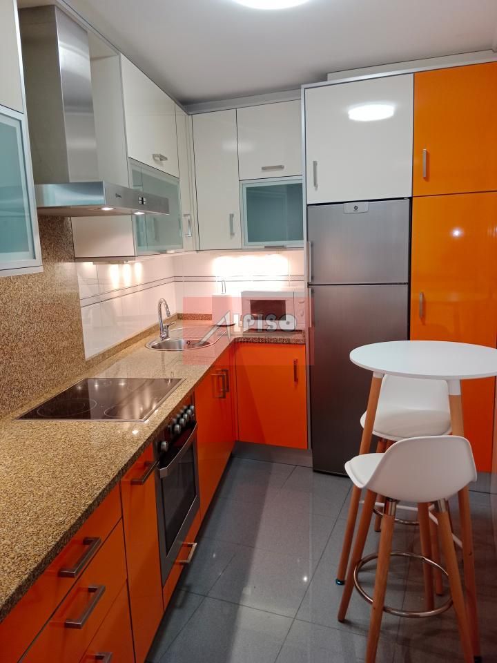 Kitchen of Flat to rent in Ourense Capital   with Heating, Parquet flooring and Furnished