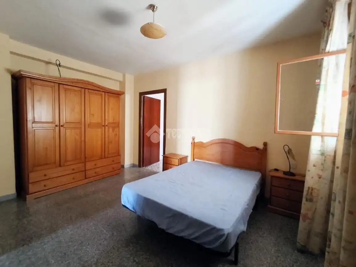 Habitación de Casa adosada en venta en Guadix