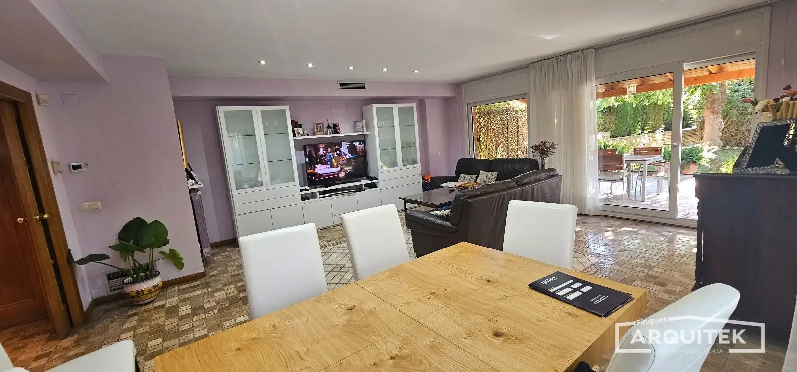 Sala de estar de Casa adosada en venta en Lleida con Aire acondicionado y Jardín privado
