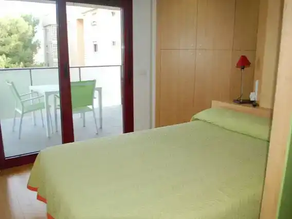 Schlafzimmer von Wohnung zur Miete in Dénia mit Klimaanlage und Schwimmbad