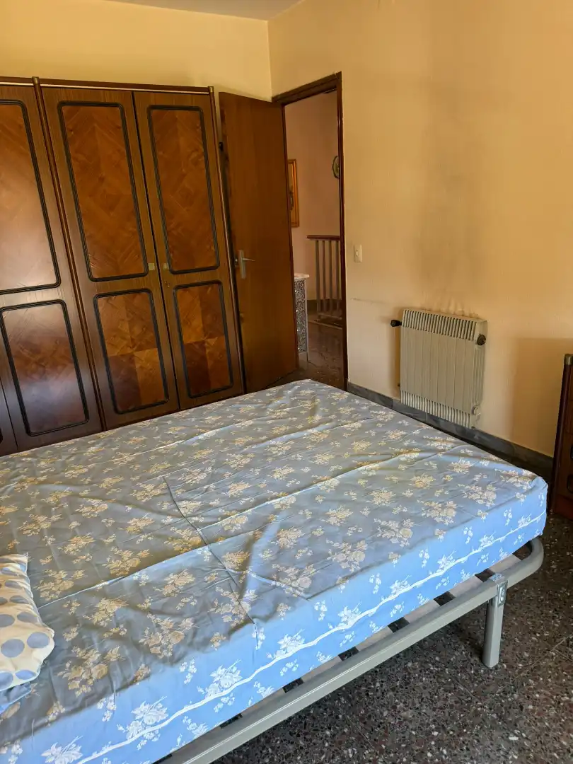 Schlafzimmer von Einfamilien-Reihenhaus zum Verkauf in Sant Celoni mit Klimaanlage, Heizung und Balkon