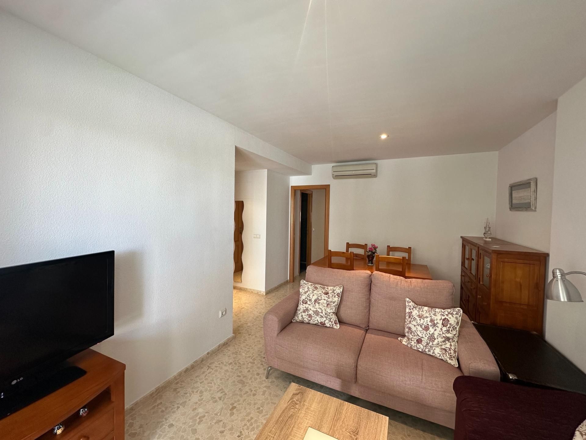 Sala de estar de Piso en venta en Gandia con Aire acondicionado, Terraza y Piscina comunitaria
