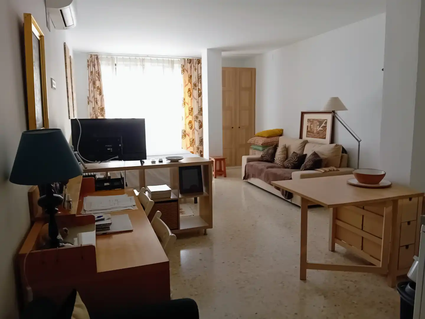 Sala d'estar de Casa adosada en venda en Málaga amb Piscina