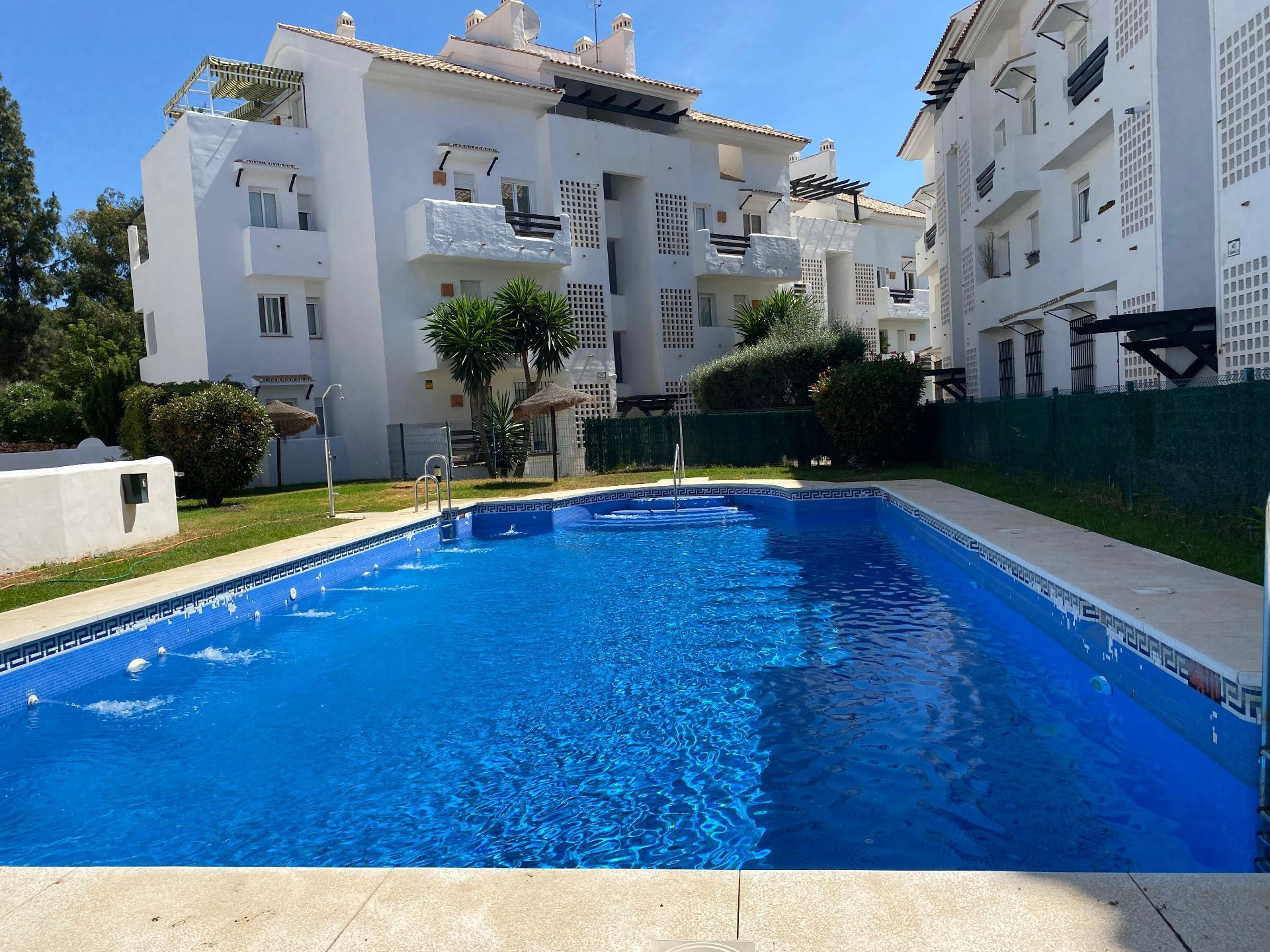 Swimming pool of Duplex for sale in Benalmádena  with Air Conditioner, Heating and Terrace
