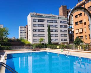 Swimming pool of Attic for sale in  Madrid Capital  with Air Conditioner, Heating and Parquet flooring