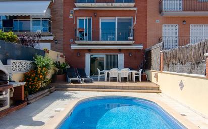 Swimming pool of Single-family semi-detached for sale in Mataró  with Air Conditioner, Terrace and Swimming Pool