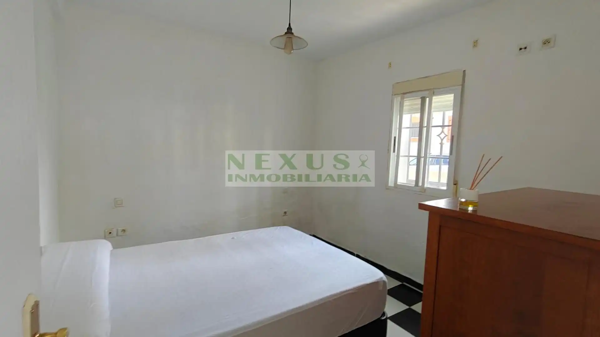 Habitación de Casa adosada en venta en Cáceres
