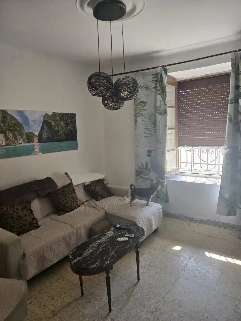 Sala d'estar de Casa adosada en venda en Vega de Ruiponce amb Jardí privat, Traster i Moblat