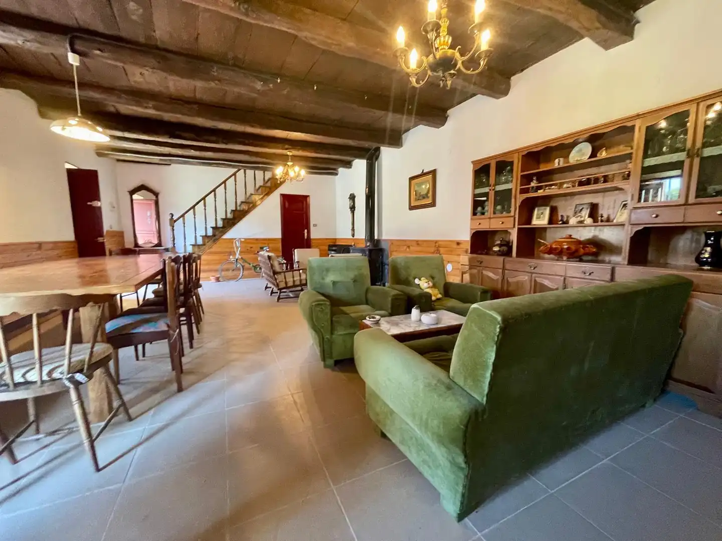 Sala d'estar de Casa o xalet en venda en Cervantes amb Jardí privat, Parquet i Moblat