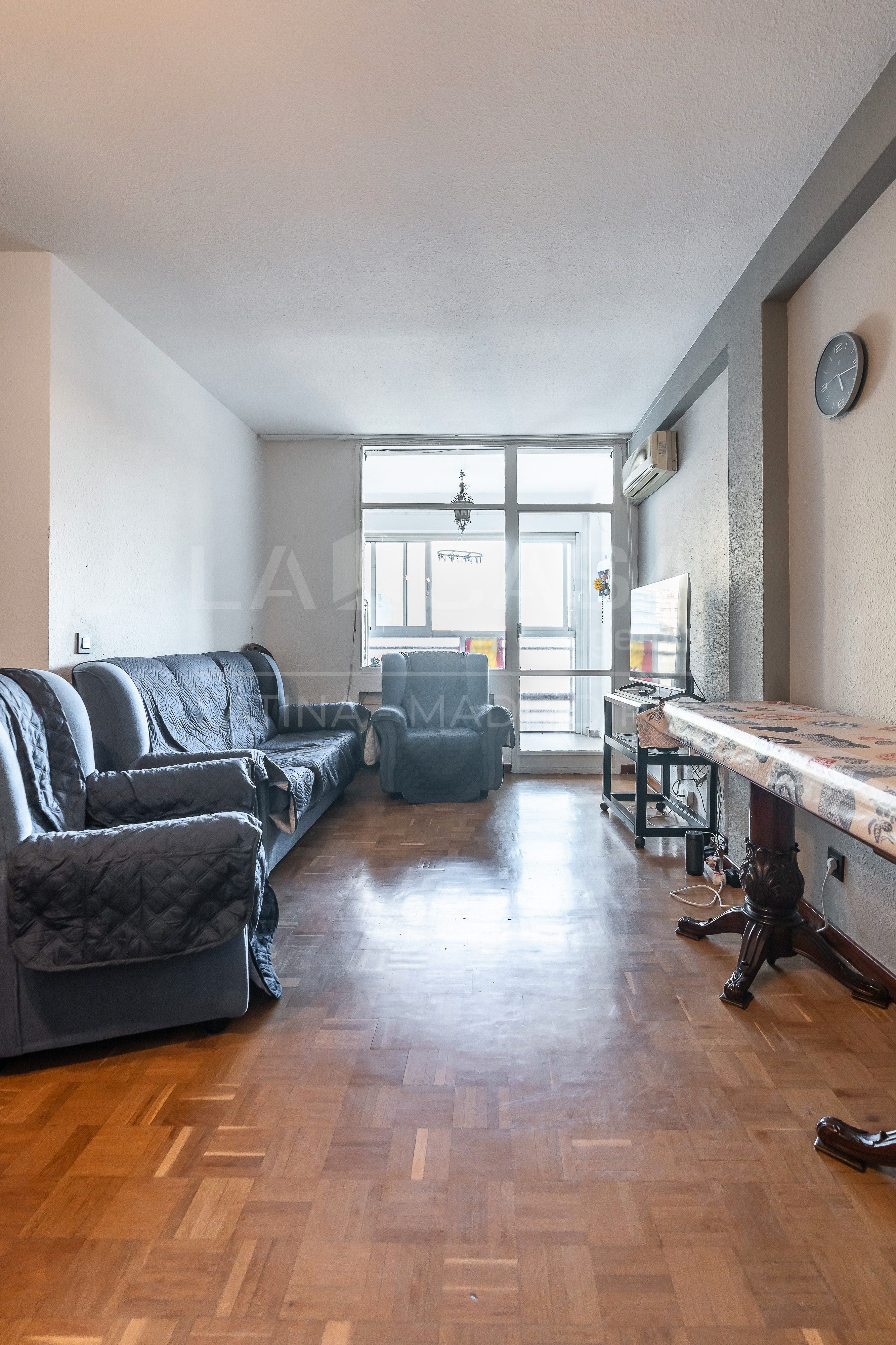 Living room of Flat for sale in  Madrid Capital  with Heating and Terrace