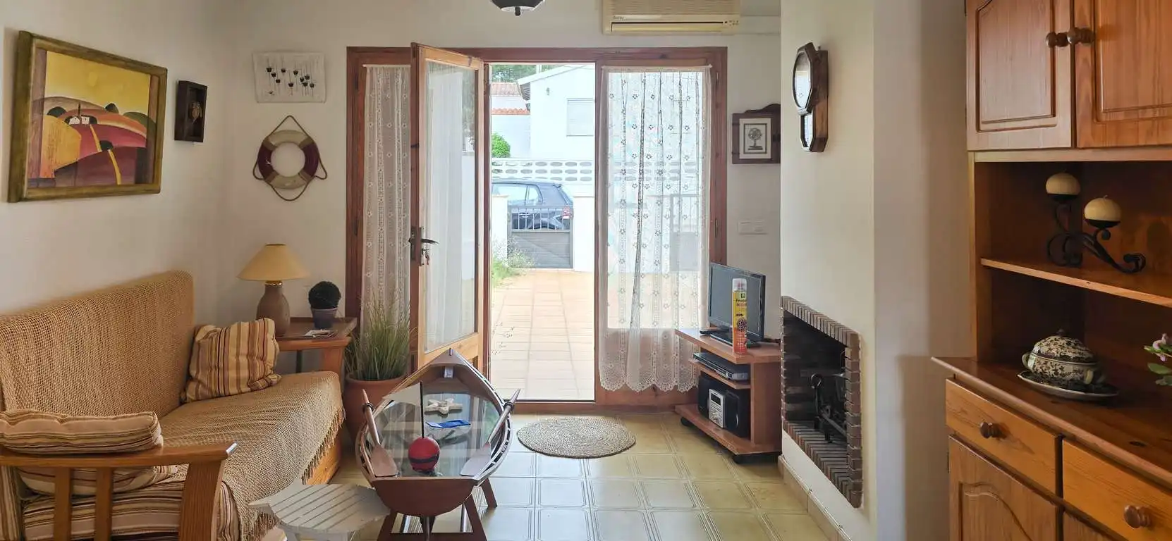 Living room of Detached homes for sale in L'Escala  with Air Conditioner, Private garden and Terrace