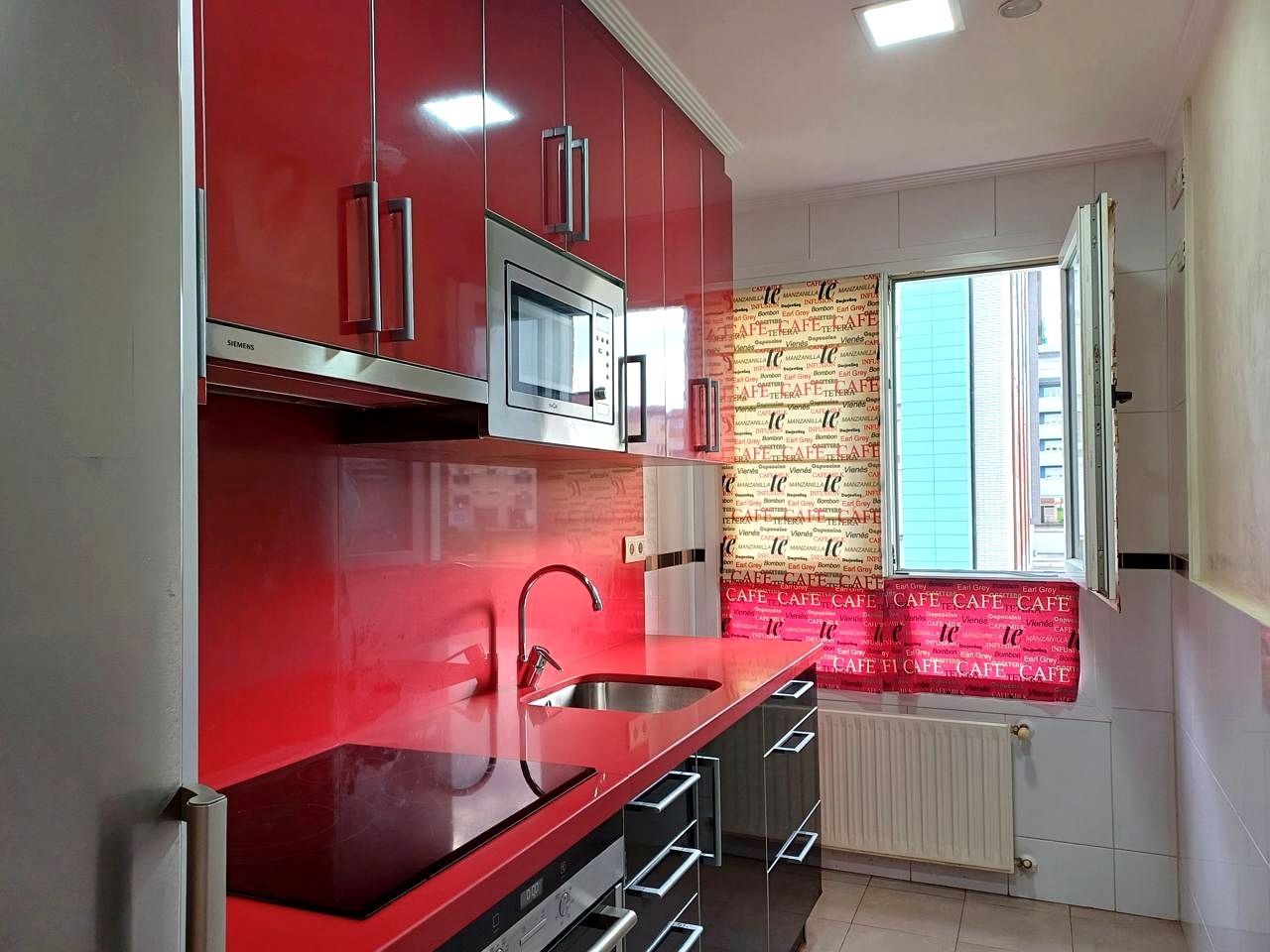Kitchen of Flat for sale in Gijón   with Heating, Parquet flooring and Storage room
