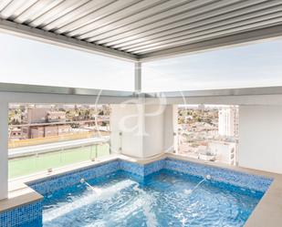 Swimming pool of Attic for sale in  Madrid Capital  with Air Conditioner, Heating and Terrace