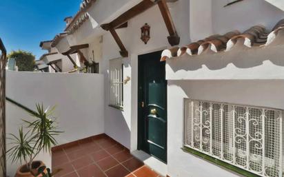 Exterior view of Single-family semi-detached for sale in Benalmádena  with Air Conditioner and Terrace