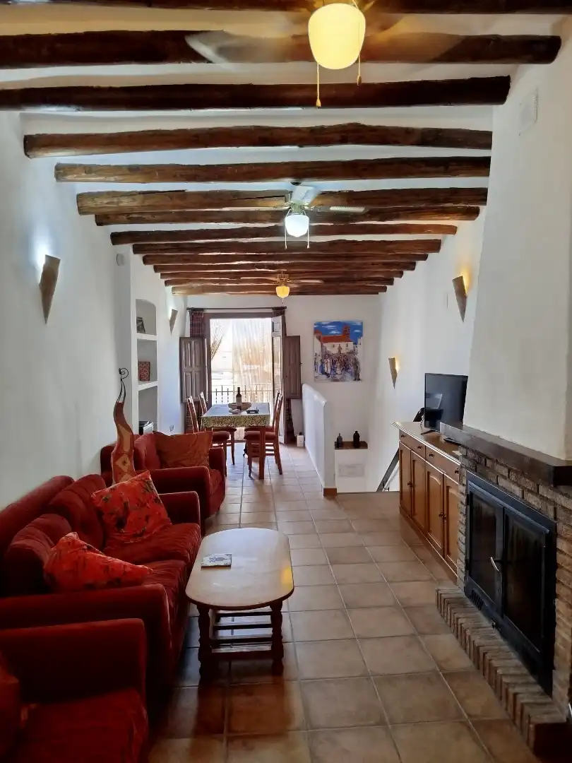 Sala d'estar de Casa adosada en venda en Nevada amb Calefacció, Terrassa i Moblat