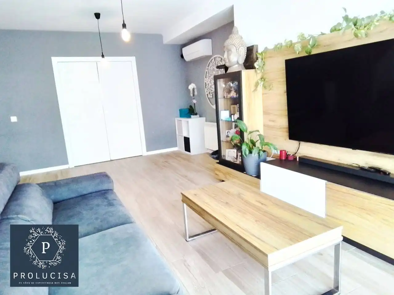 Sala d'estar de Casa adosada en venda en Moraleja de Enmedio amb Aire condicionat, Calefacció i Terrassa