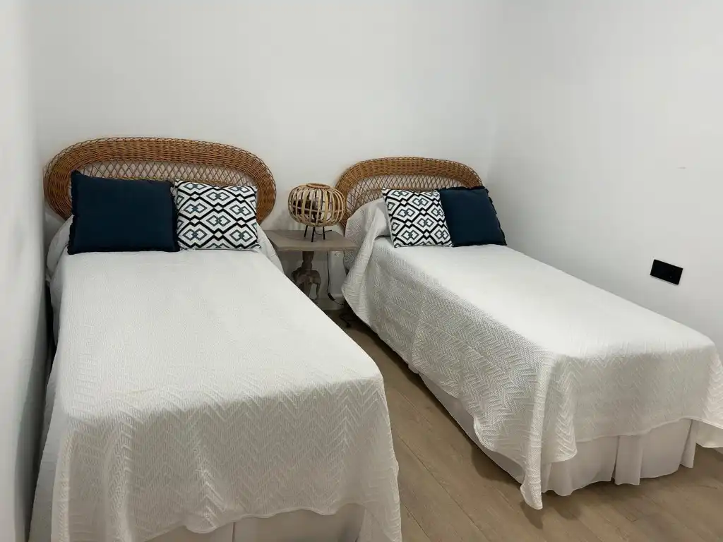 Dormitori de Casa adosada de lloguer en Vélez-Málaga amb Aire condicionat