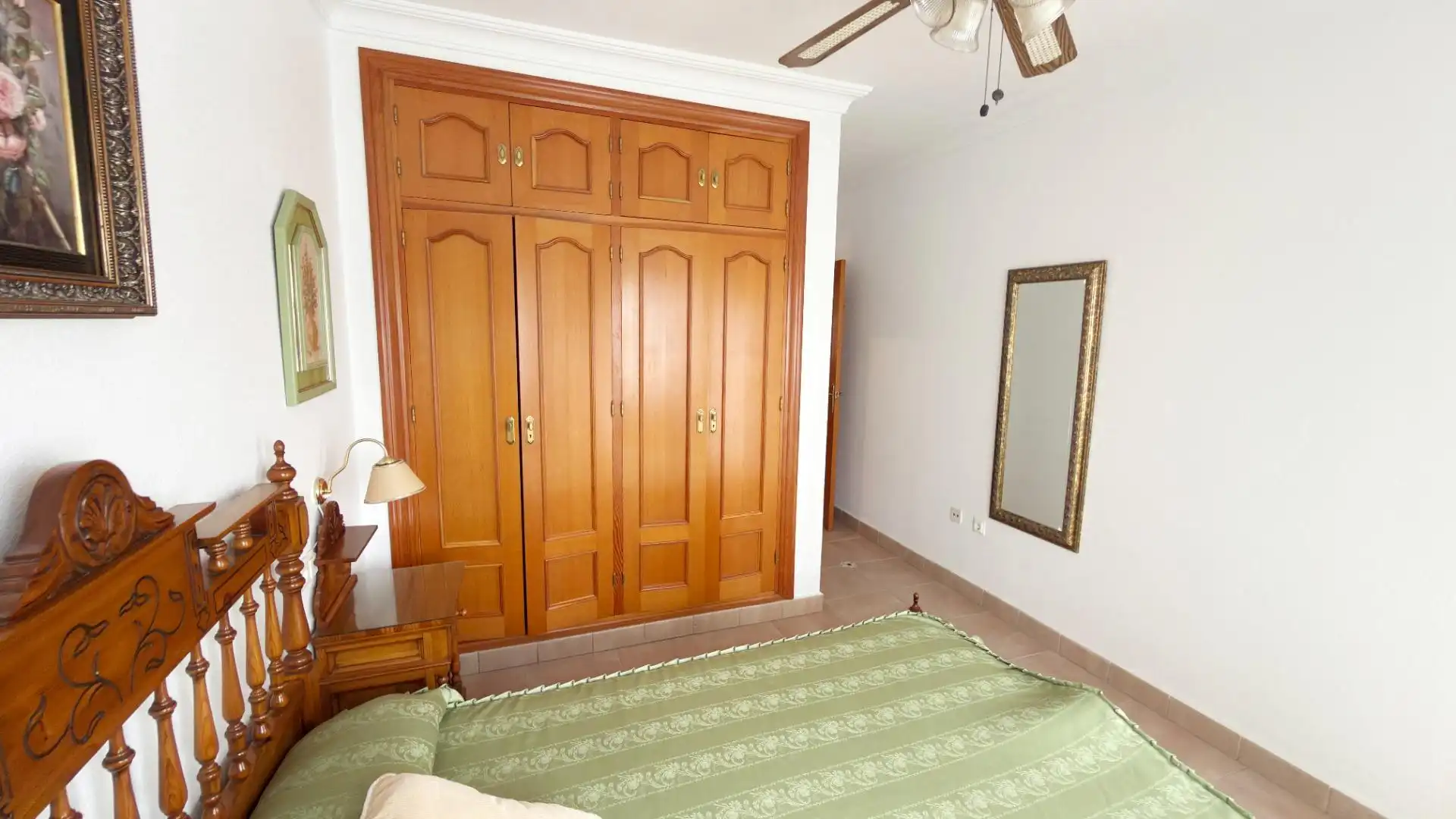 Habitación de Casa adosada de alquiler en Punta Umbría con Terraza y Piscina comunitaria