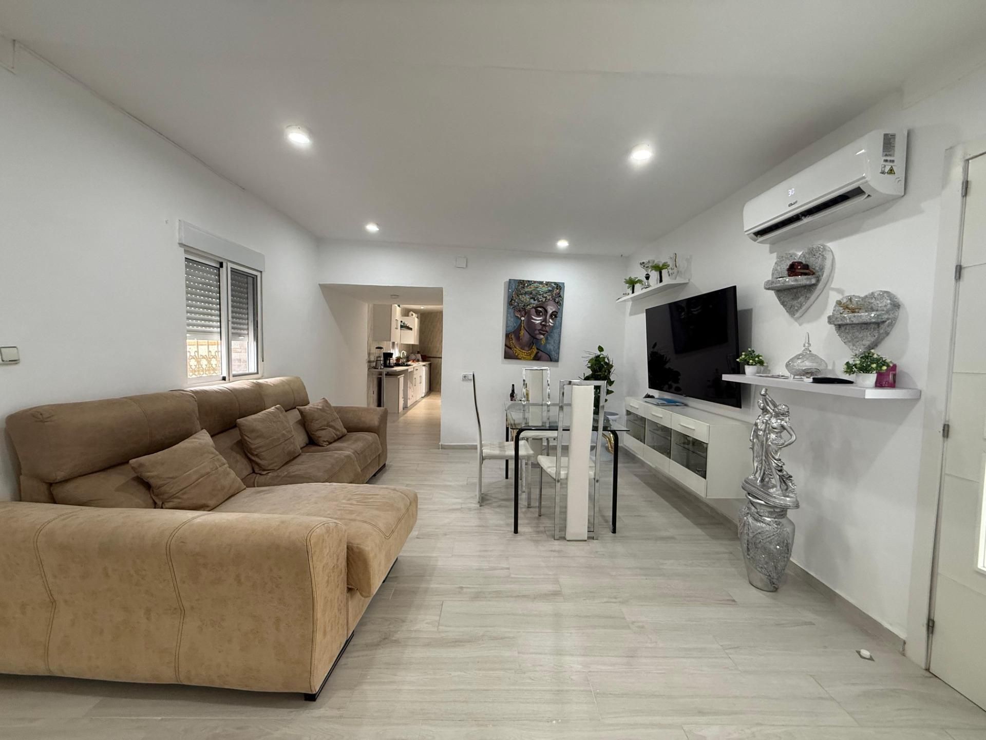 Sala d'estar de Casa o xalet en venda en El Cuervo de Sevilla amb Aire condicionat