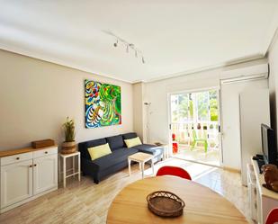 Sala d'estar de Apartament de lloguer en Elche / Elx amb Aire condicionat, Jardí privat i Terrassa