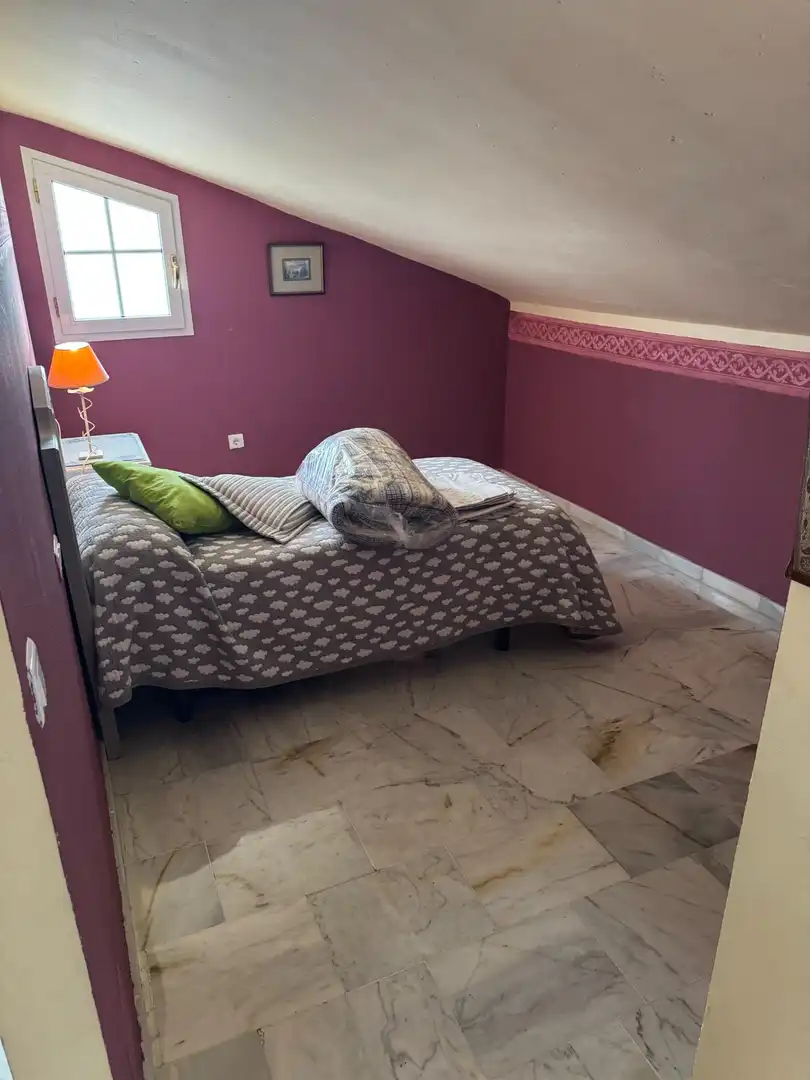 Dormitori de Casa adosada en venda en Morón de la Frontera amb Aire condicionat, Jardí privat i Moblat