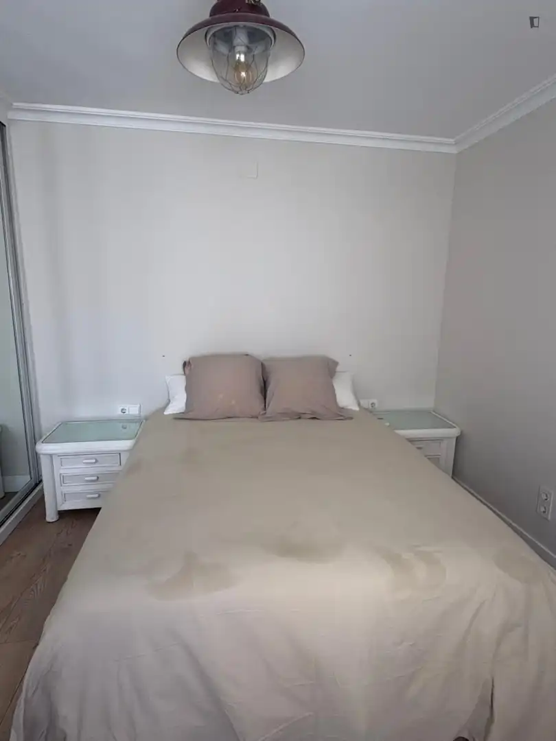 Habitación de Apartamento de alquiler en Valencia con Aire acondicionado y Amueblado