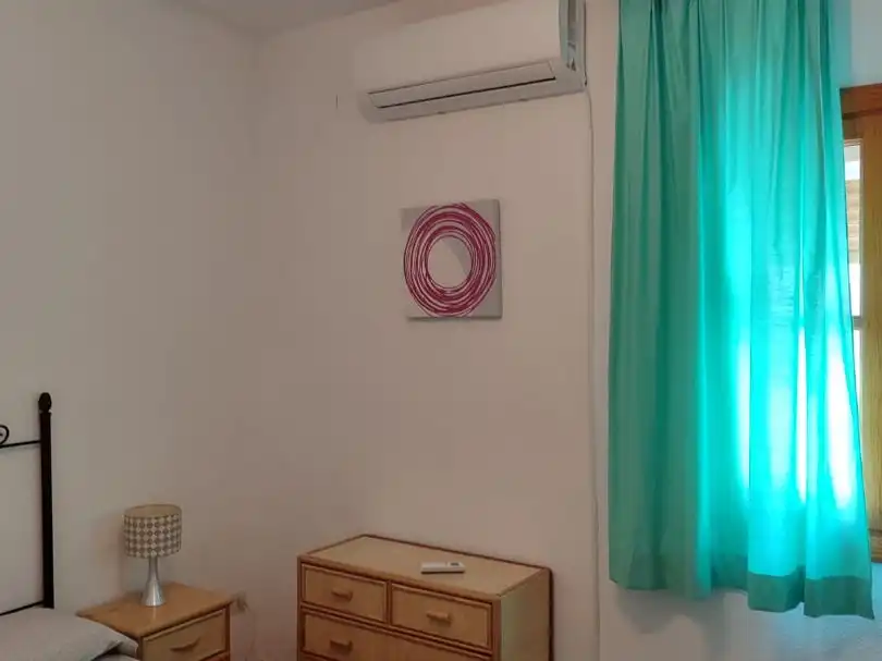 Bedroom of Flat for share in Almagro  with Air Conditioner, Heating and Furnished