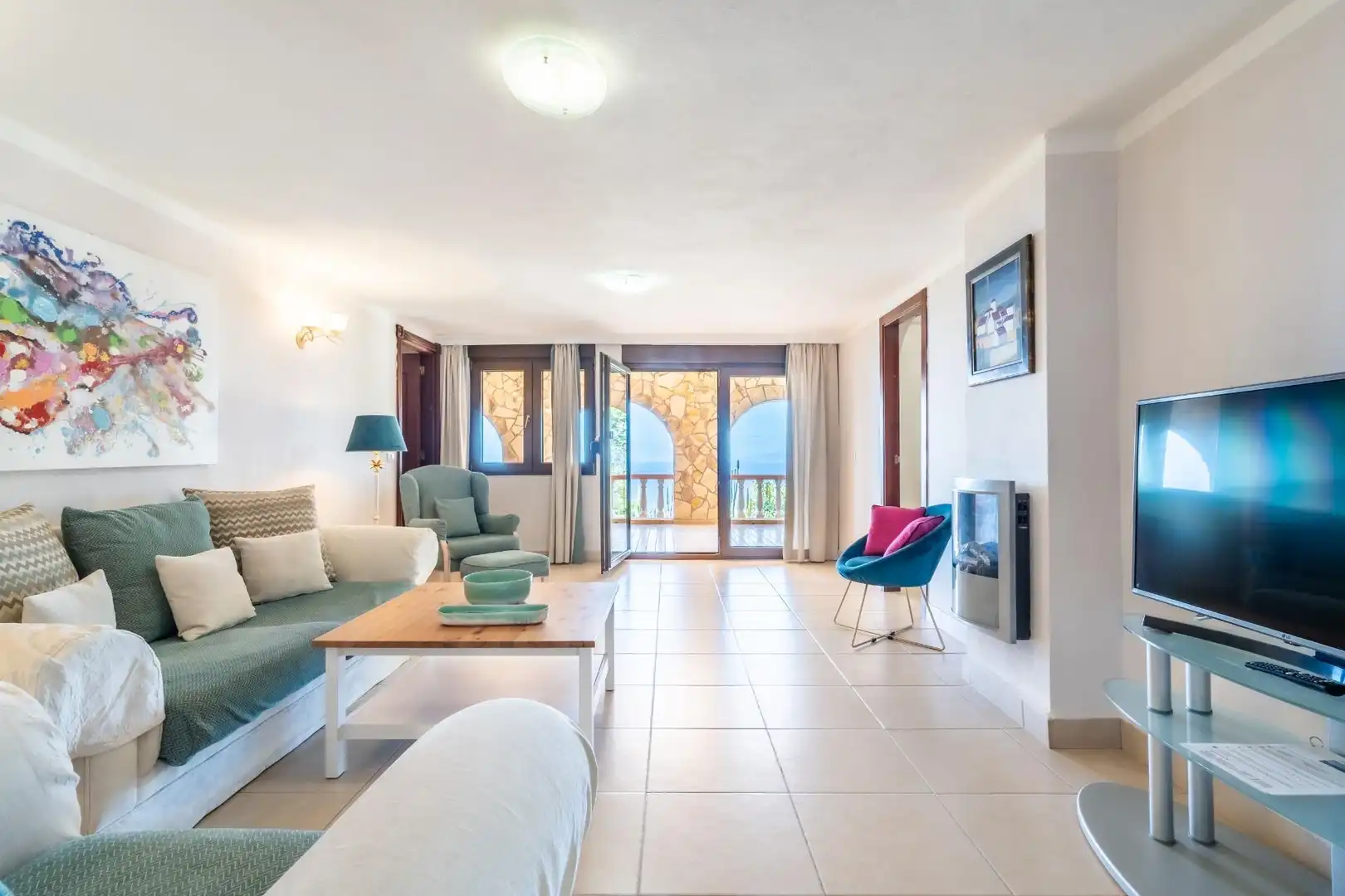 Sala d'estar de Casa o xalet en venda en Guía de Isora amb Aire condicionat, Jardí privat i Terrassa