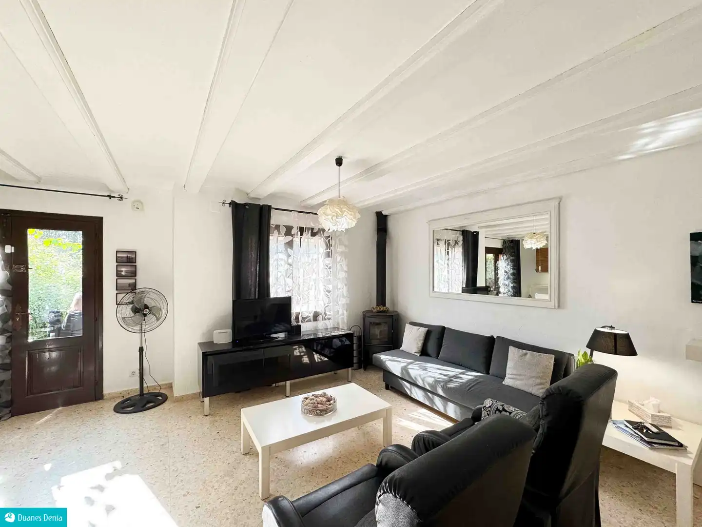 Sala d'estar de Casa adosada en venda en Dénia amb Aire condicionat, Jardí privat i Terrassa