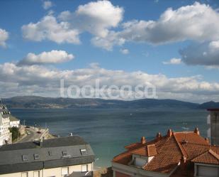 Exterior view of Attic for sale in Sanxenxo  with Parquet flooring, Terrace and Storage room