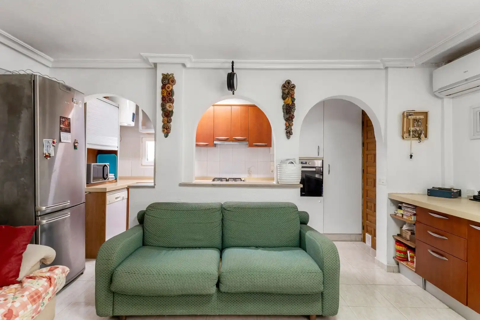 Sala de estar de Casa adosada en venta en Torrevieja con Aire acondicionado, Jardín privado y Terraza