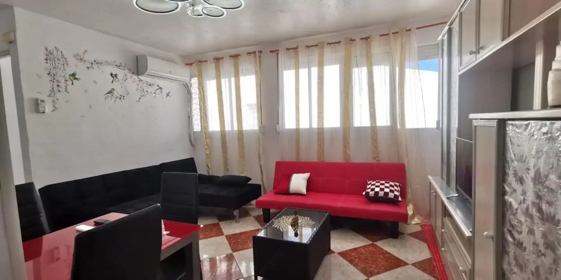 Sala de estar de Apartamento de alquiler en Málaga con Aire acondicionado, Piscina y Amueblado