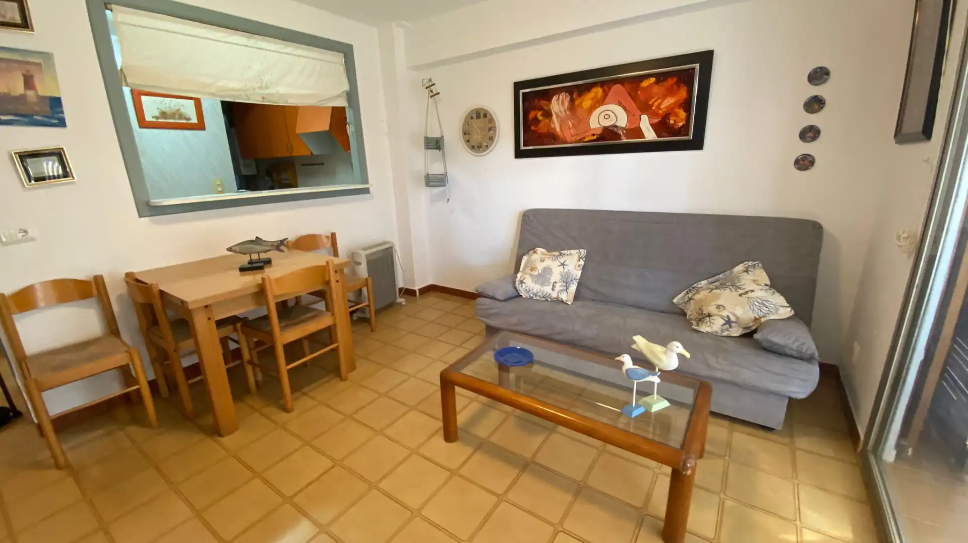 Sala d'estar de Apartament en venda en Benicasim / Benicàssim amb Jardí privat, Terrassa i Moblat