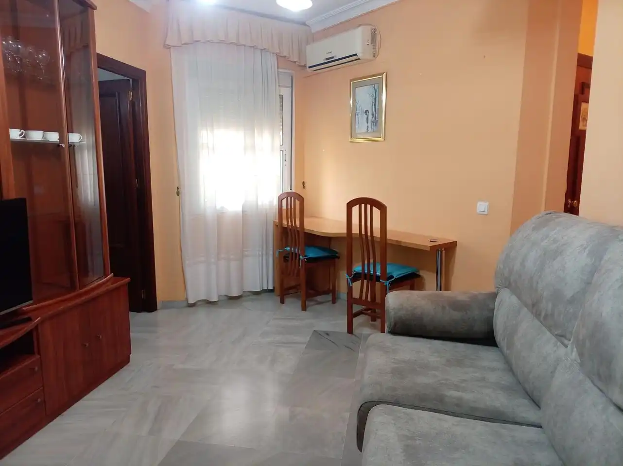 Sala d'estar de Apartament de lloguer en Alcalá de Guadaira amb Aire condicionat i Moblat