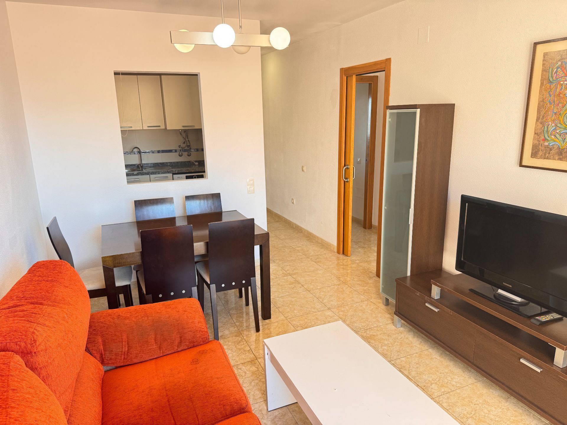 Sala d'estar de Apartament en venda en Roquetas de Mar amb Aire condicionat, Terrassa i Moblat