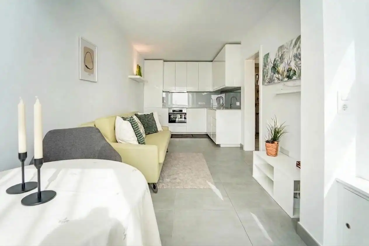 Sala de estar de Apartamento en venta en Mogán con Aire acondicionado, Jardín privado y Terraza