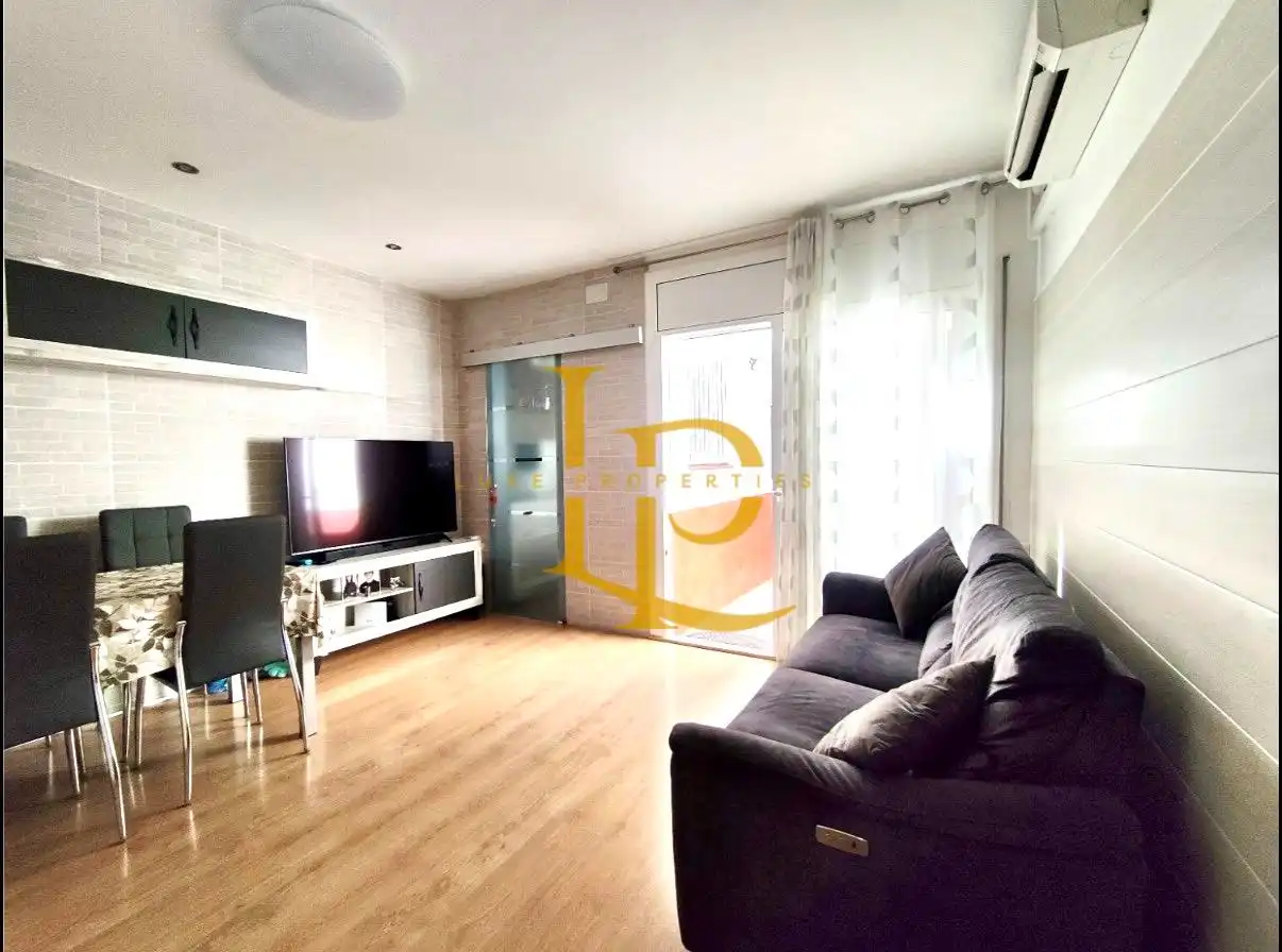 Sala d'estar de Casa o xalet en venda en Sabadell amb Aire condicionat, Parquet i Terrassa