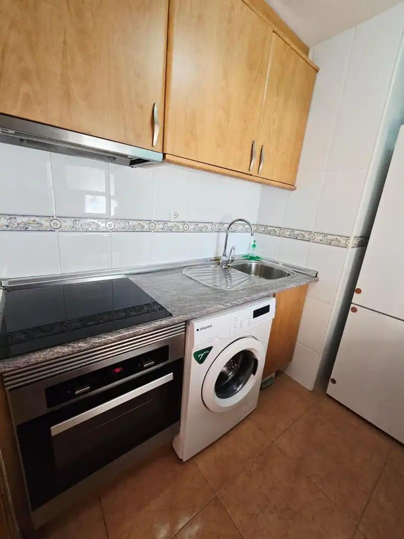 Cuina de Apartament en venda en Benidorm amb Aire condicionat, Moblat i Piscina comunitària