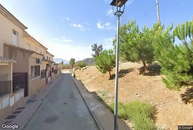 Vista exterior de Casa adosada en venda en Pizarra amb Piscina i Balcó