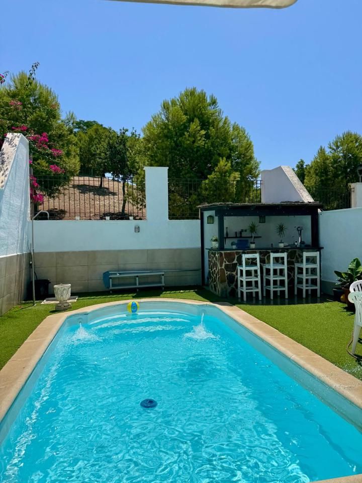 Piscina de Casa adosada en venda en Málaga Capital amb Aire condicionat, Calefacció i Jardí privat