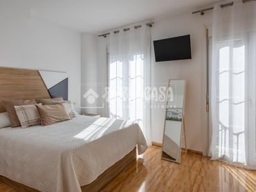 Casa aparellada amb balcó en venda a Vélez-Málaga ciudad