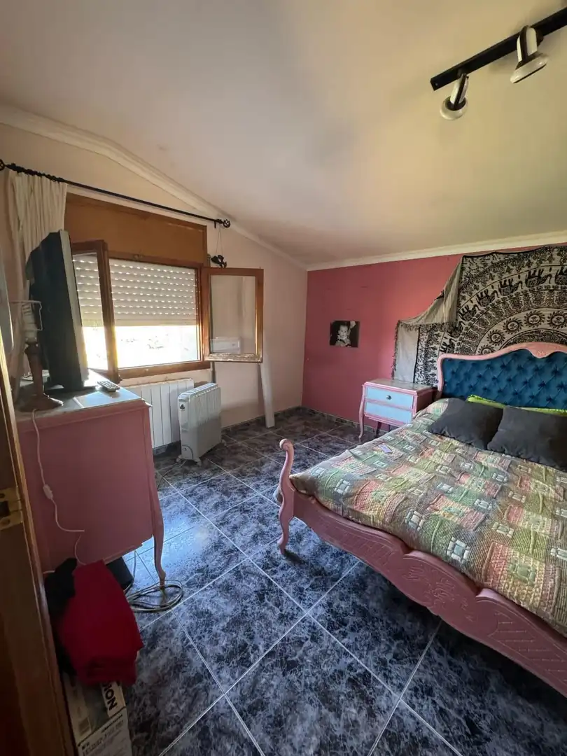 Dormitori de Casa adosada en venda en Alcañiz amb Terrassa, Traster i Piscina comunitària
