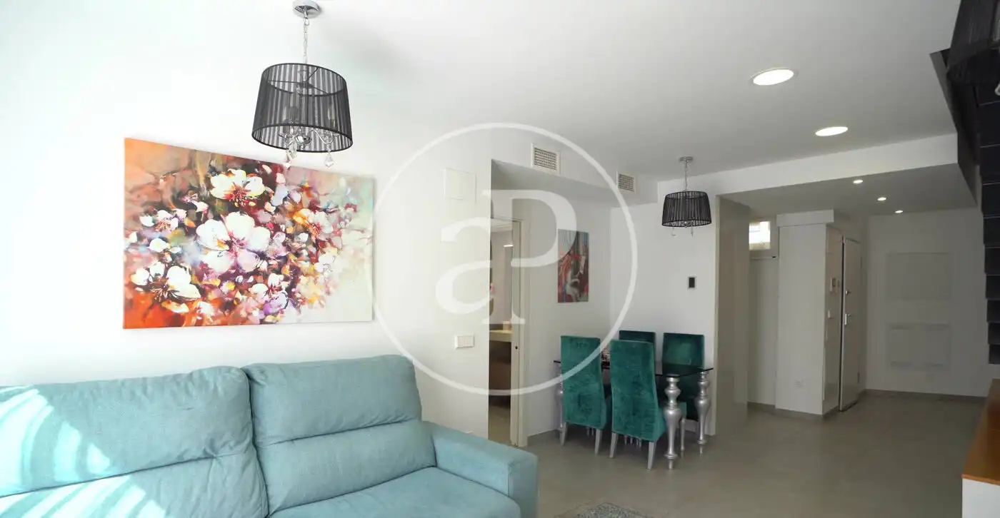 Wohnzimmer von Einfamilien-Reihenhaus zum Verkauf in Villajoyosa / La Vila Joiosa mit Klimaanlage, Heizung und Privatgarten