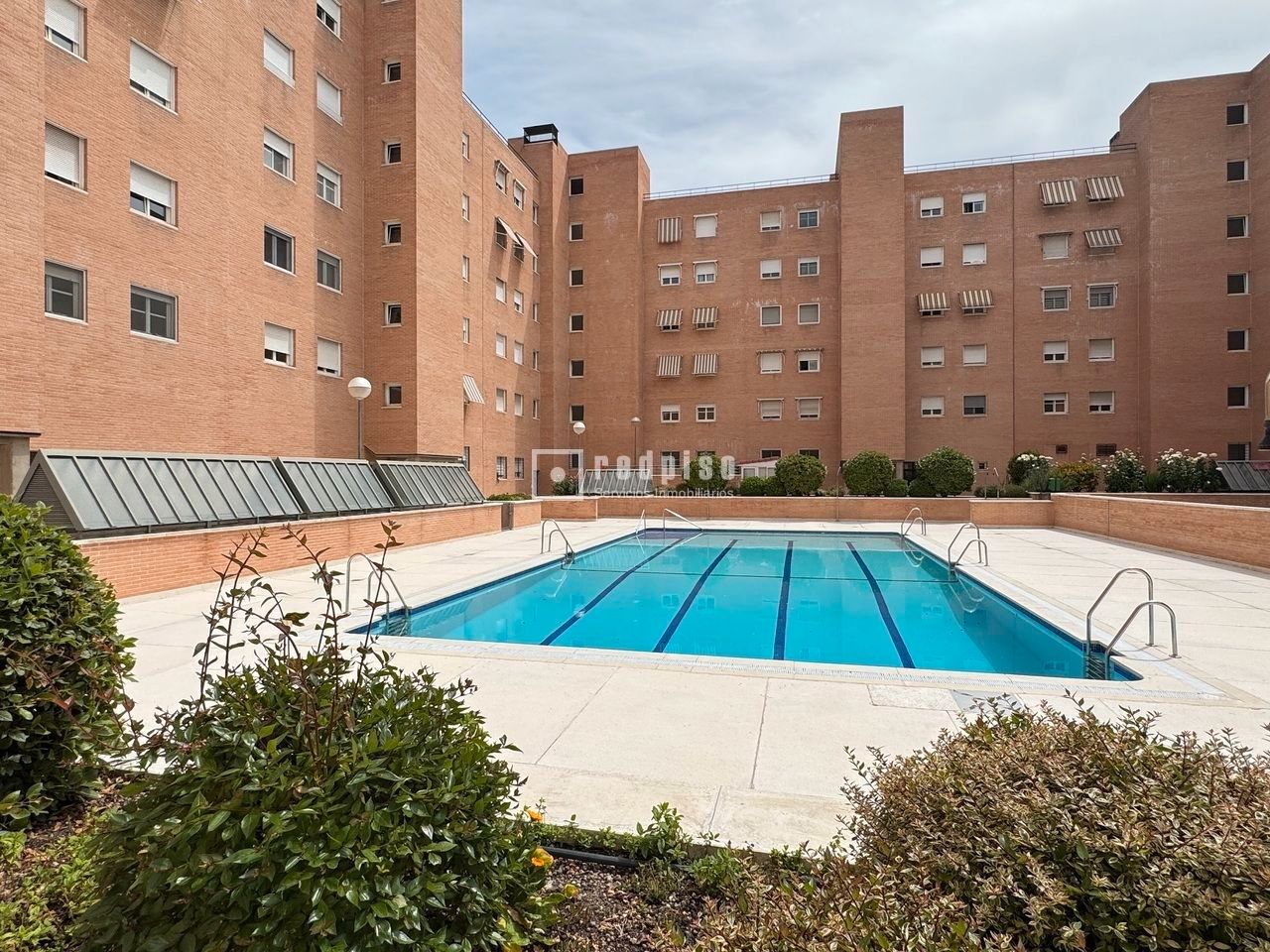 Swimming pool of Flat for sale in  Madrid Capital  with Heating, Parquet flooring and Storage room