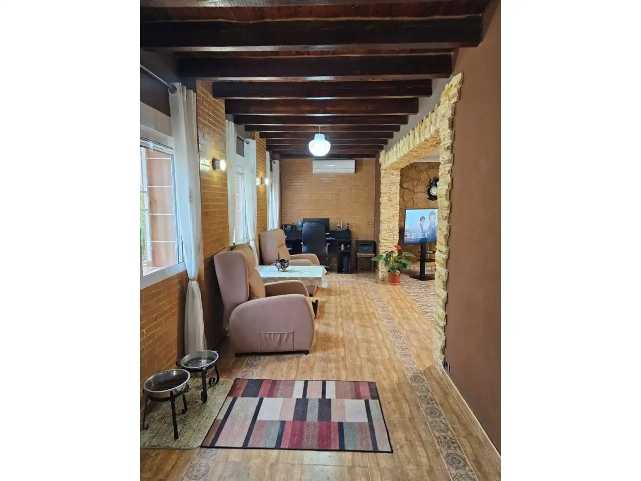 Sala d'estar de Casa o xalet en venda en Alicante / Alacant amb Aire condicionat, Calefacció i Jardí privat