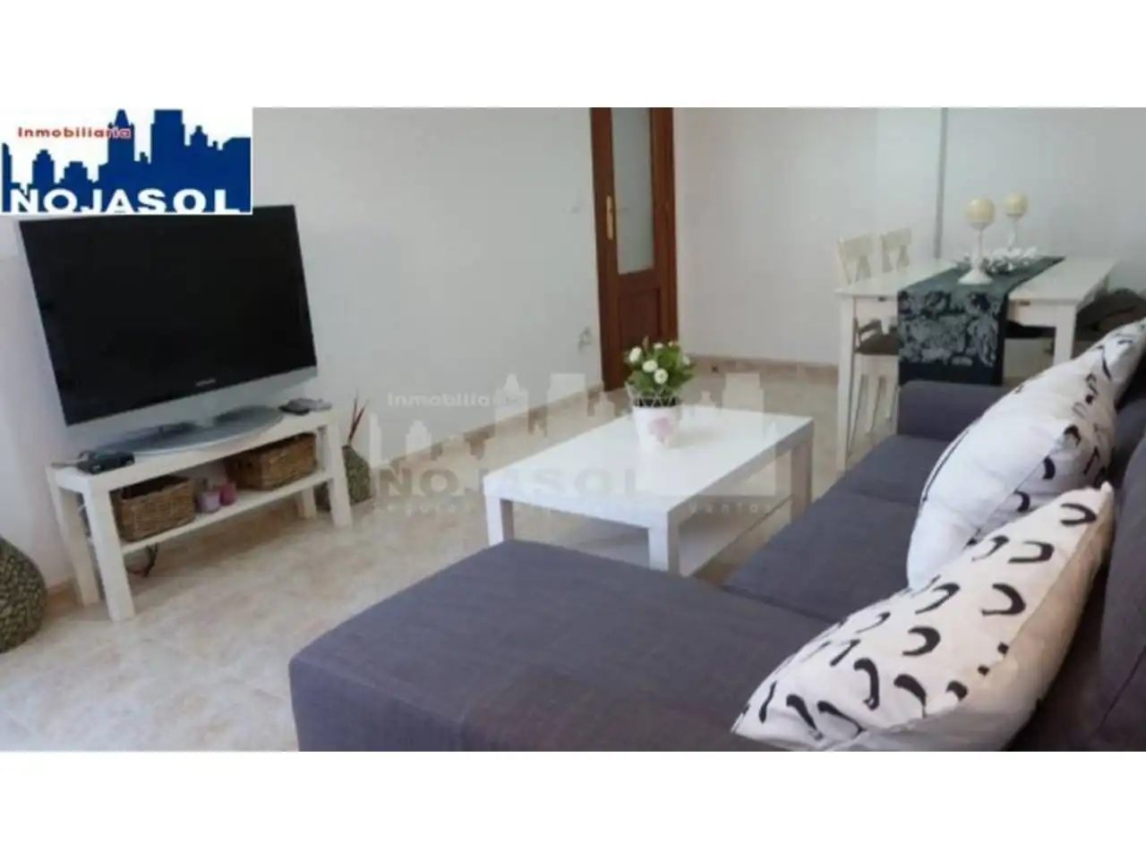 Sala d'estar de Àtic de lloguer en Noja amb Calefacció, Terrassa i Moblat