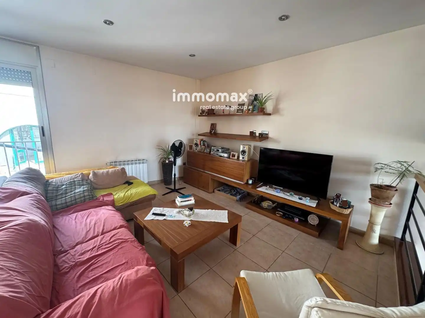 Sala d'estar de Casa adosada en venda en El Milà amb Terrassa