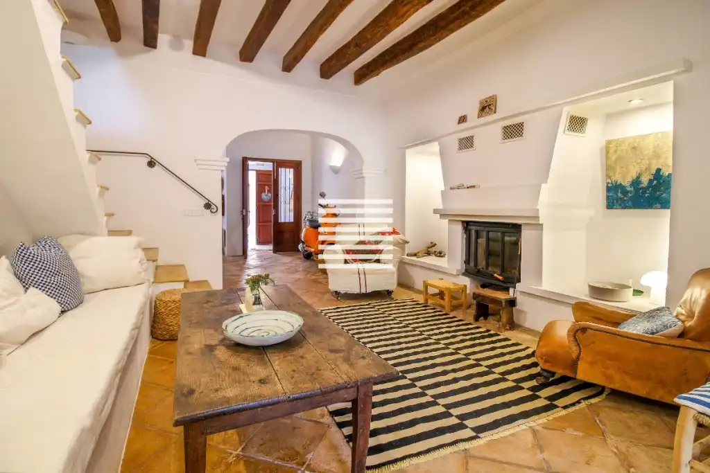 Sala de estar de Casa adosada en venta en Pollença con Aire acondicionado y Amueblado